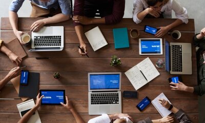 top view photo of people near wooden table 3183150